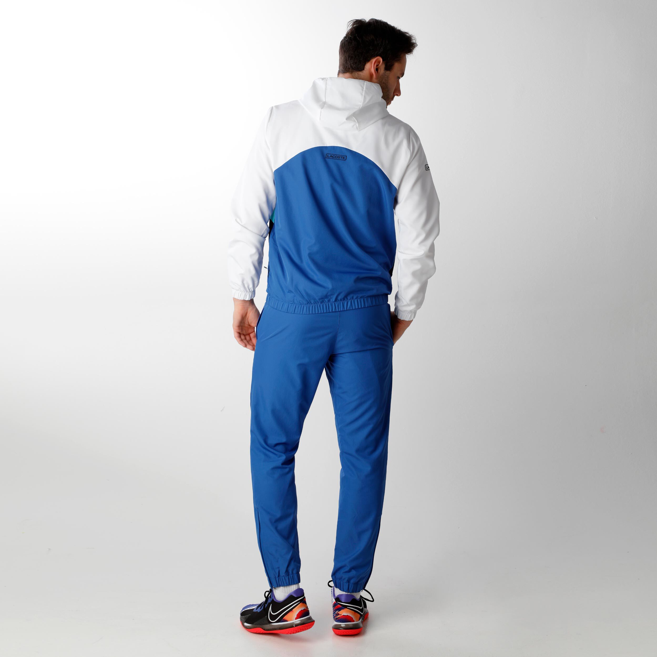Lacoste trainingspak 2025 blauw wit