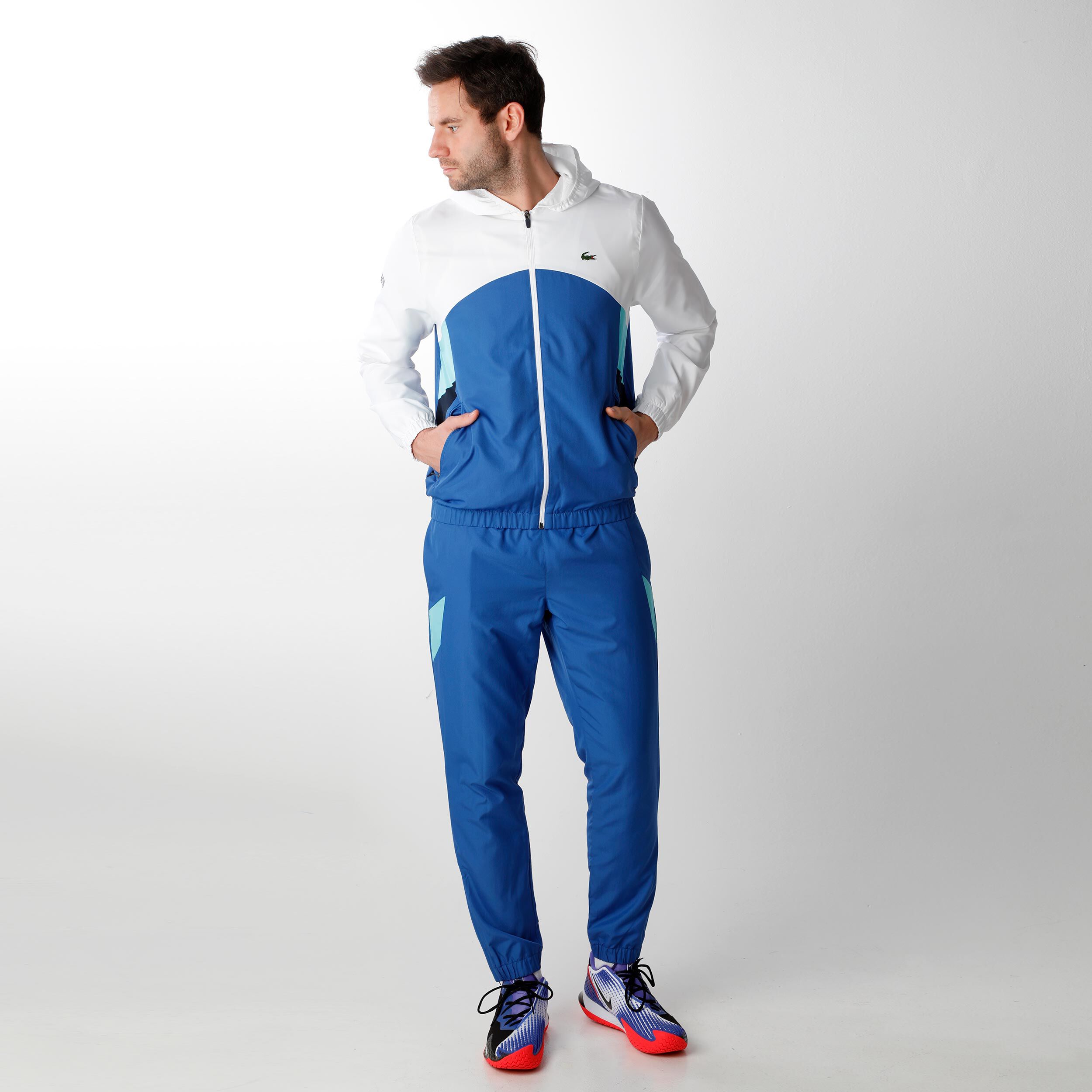 Lacoste trainingspak 2025 blauw wit